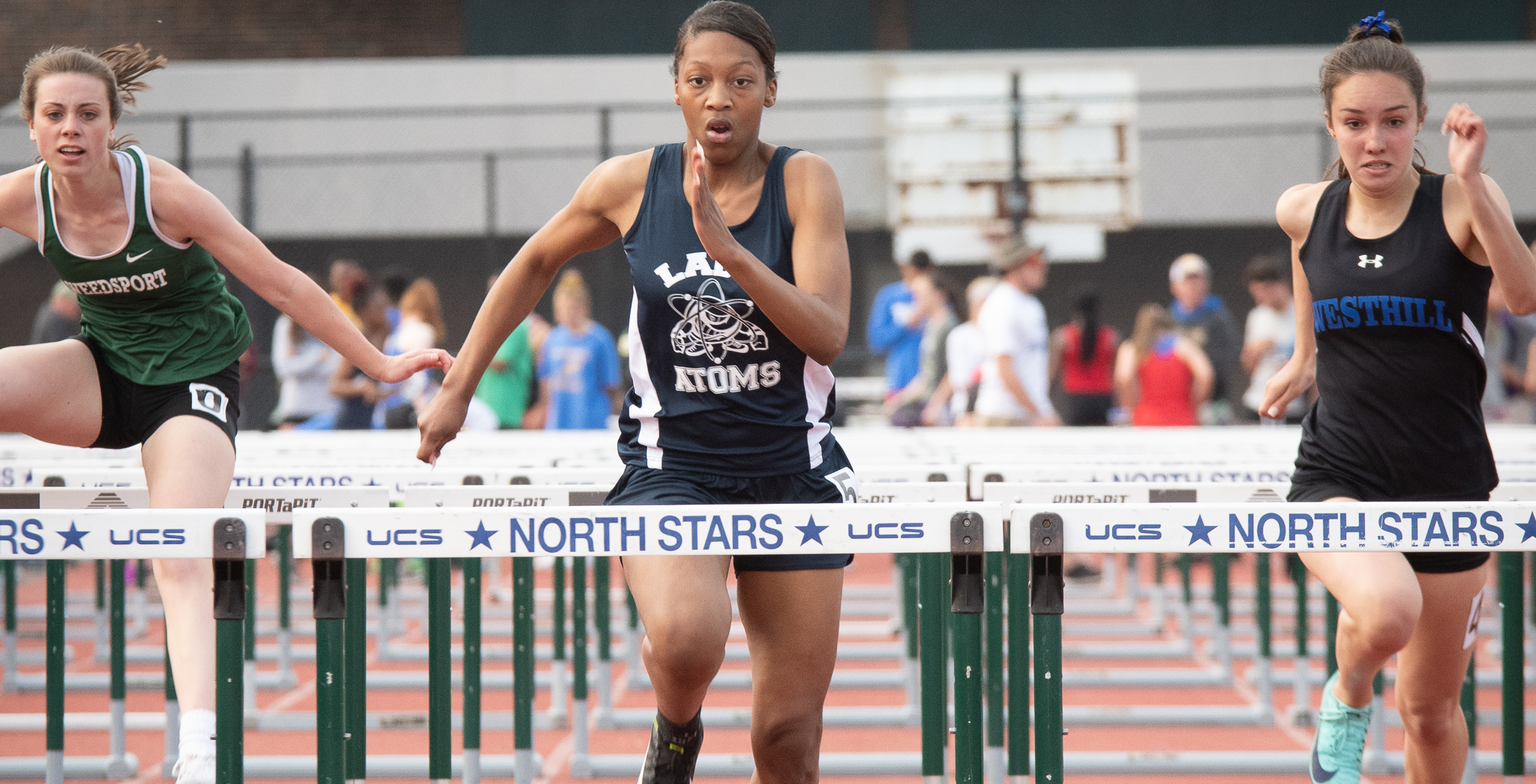 Justine Bell competes in the 100M Hurdle at the NYSPHSAA State Qualifying Meet