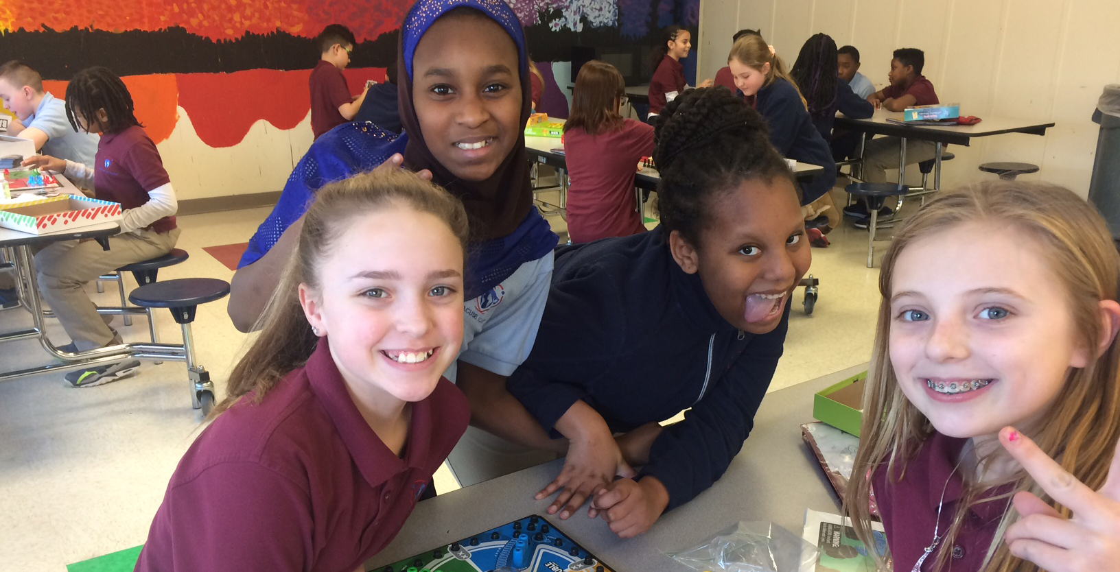 Syracuse Academy of Science Middle School Students Play Board Games
