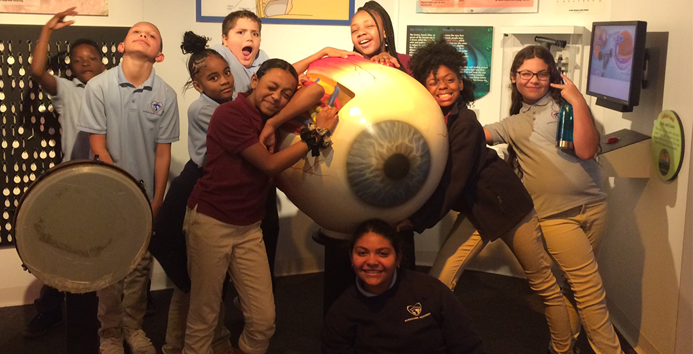 Middle school Atoms become scientists for the day on a field trip to Syracuse’s science museum, MOST