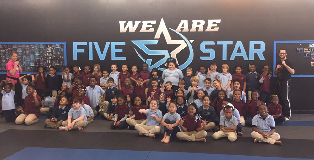 Elementary students visit Five Star Martial Arts on a class field trip
