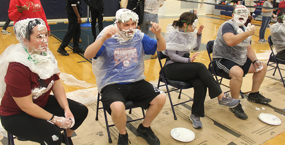 High school Atoms pied their favorite teacher, faculty or staff member in the face for a school spirit activity leading up to winter recess