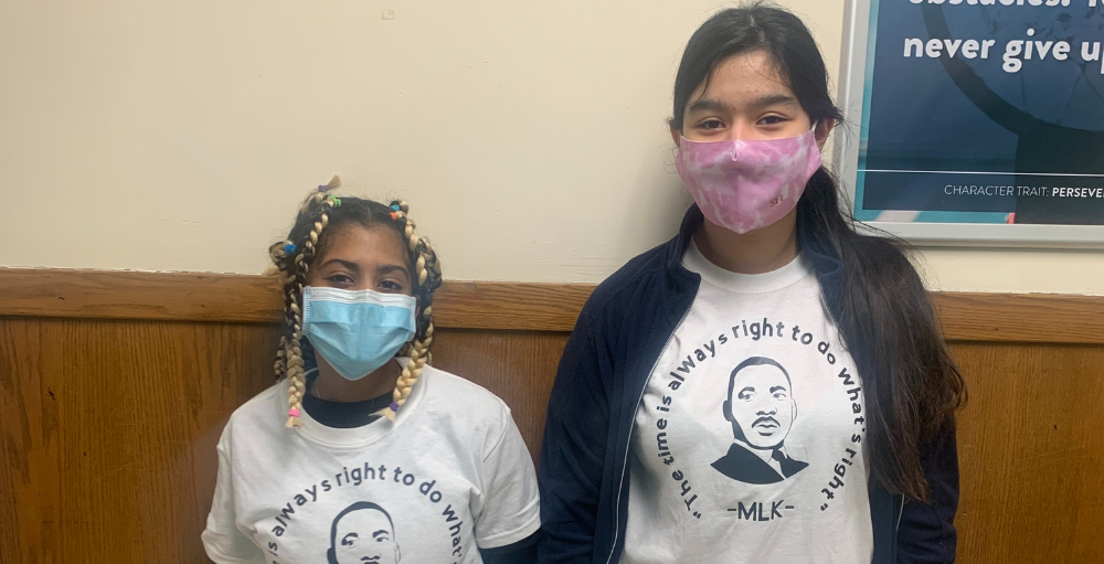 Syracuse Academy of Science middle school students wear Dr. Martin Luther King Jr. t-shirts for participating in the Art and Writing Contest in honor of Black History Month and Dr. Martin Luther King Jr. Day.