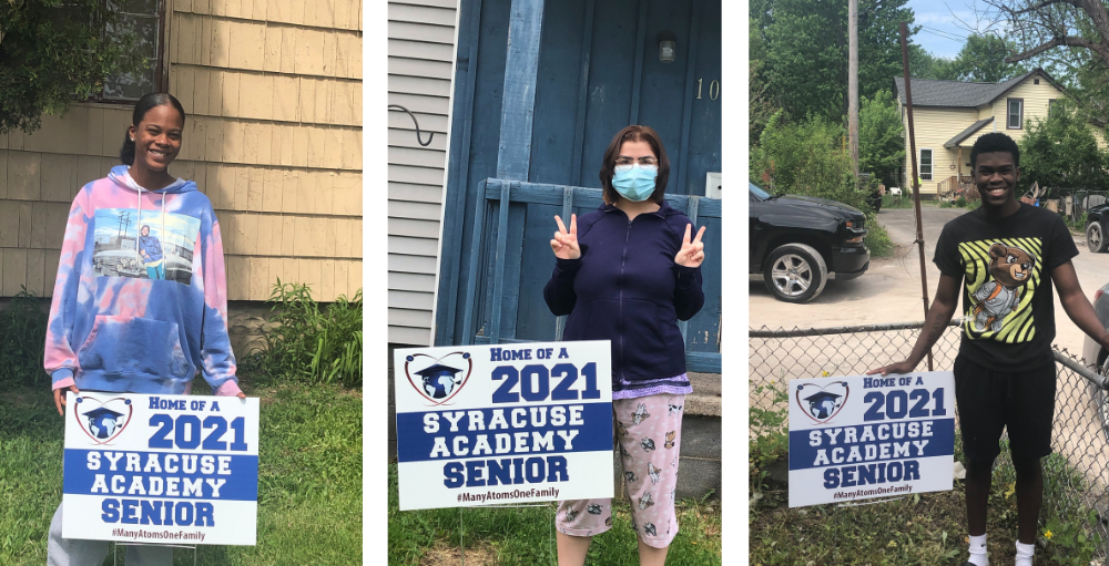 Syracuse Academy of Science high school students from the class of 2021 received a special surprise graduation gift of a yard sign from Syracuse Academy of Science high school faculty, staff & administration team.