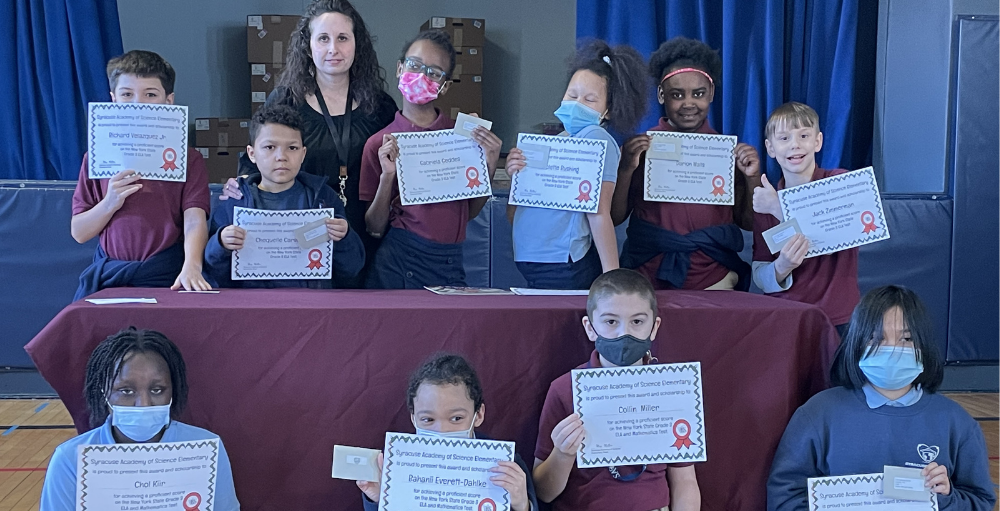  Syracuse Academy of Science elementary and high school students received awards from Terra Science and Education for their achievements in New York State testing.