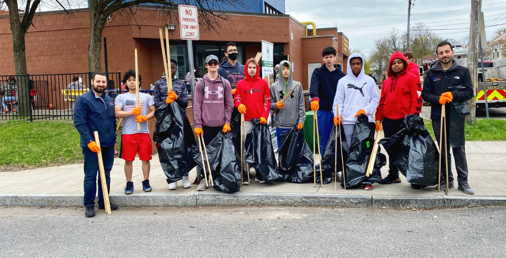 Syracuse Academy of Science high school congressional awards students volunteered their time to help in a local Earth Day Street Cleaning project.