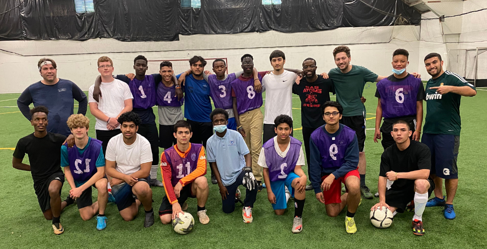 Syracuse Academy of Science high school hosted its annual Students vs. Staff soccer match at Syracuse Indoor Sports Center, where the staff won 11-9.