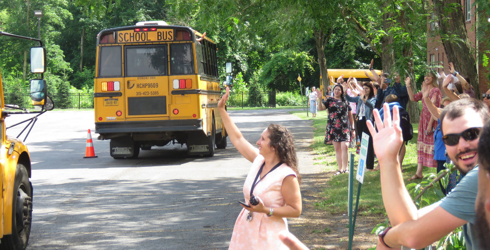 Syracuse Academy of Science elementary school continues with their last day of school tradition by having teachers line the parking lot to wave goodbye to the students.