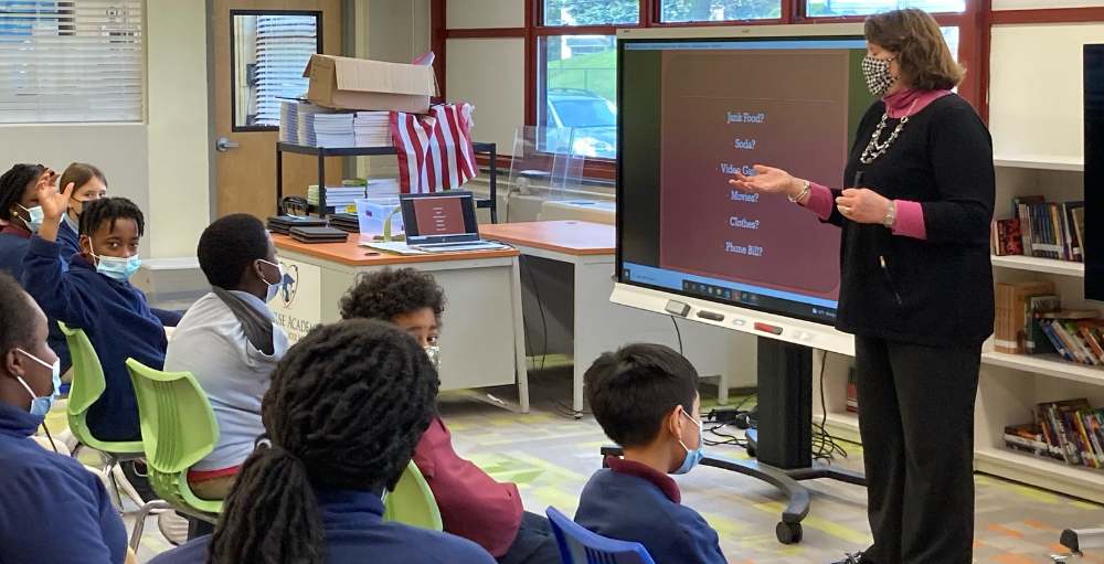 Syracuse Academy of Science middle school PBL students welcomed guest speaker Cheryl Wells from Empower Federal Credit Union who spoke about the importance of having a budget.