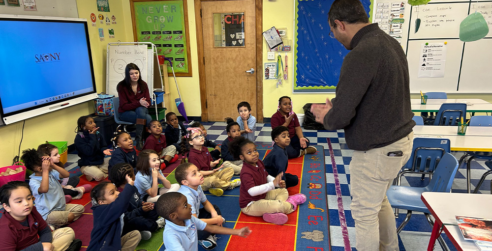 The Science Academies of New York Superintendent Reads to SAS Kindergarteners