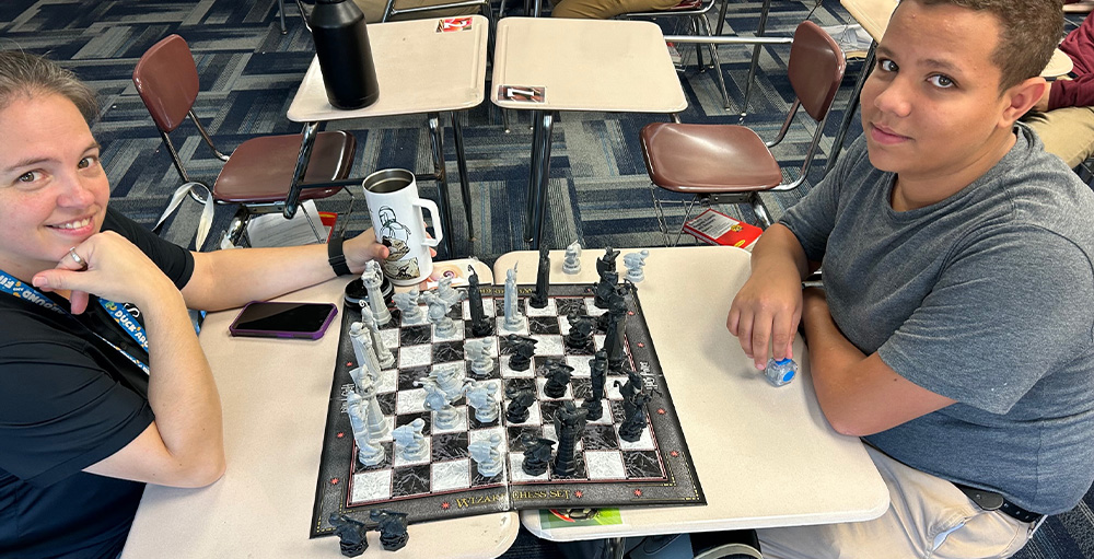 SAS HS Atoms Challenge Each Other at Chess Club - Syracuse Academy